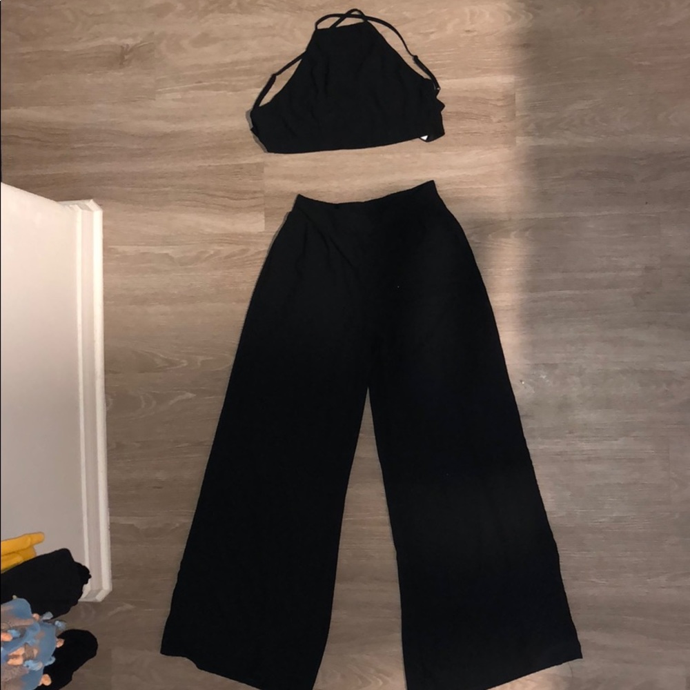 Two piece jumpsuit with a high neck halter top